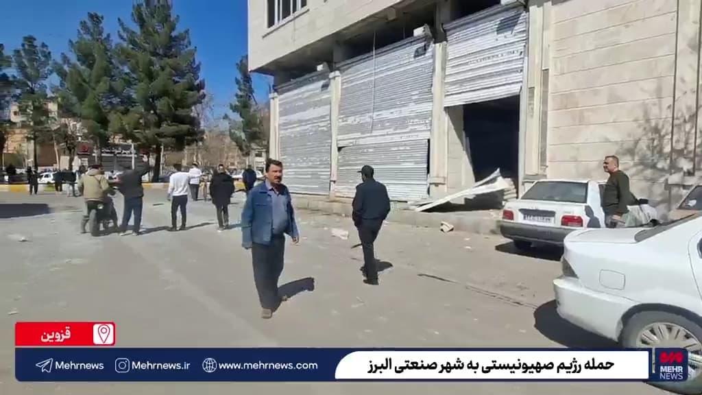 A store with an obliterated front facade can be seen